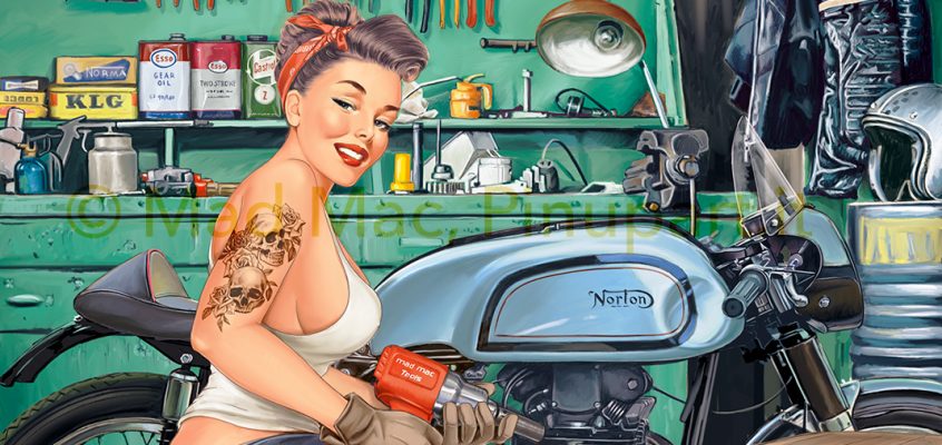 Mechanic Pin-Up in a motorbike garage: tuning of a classic!